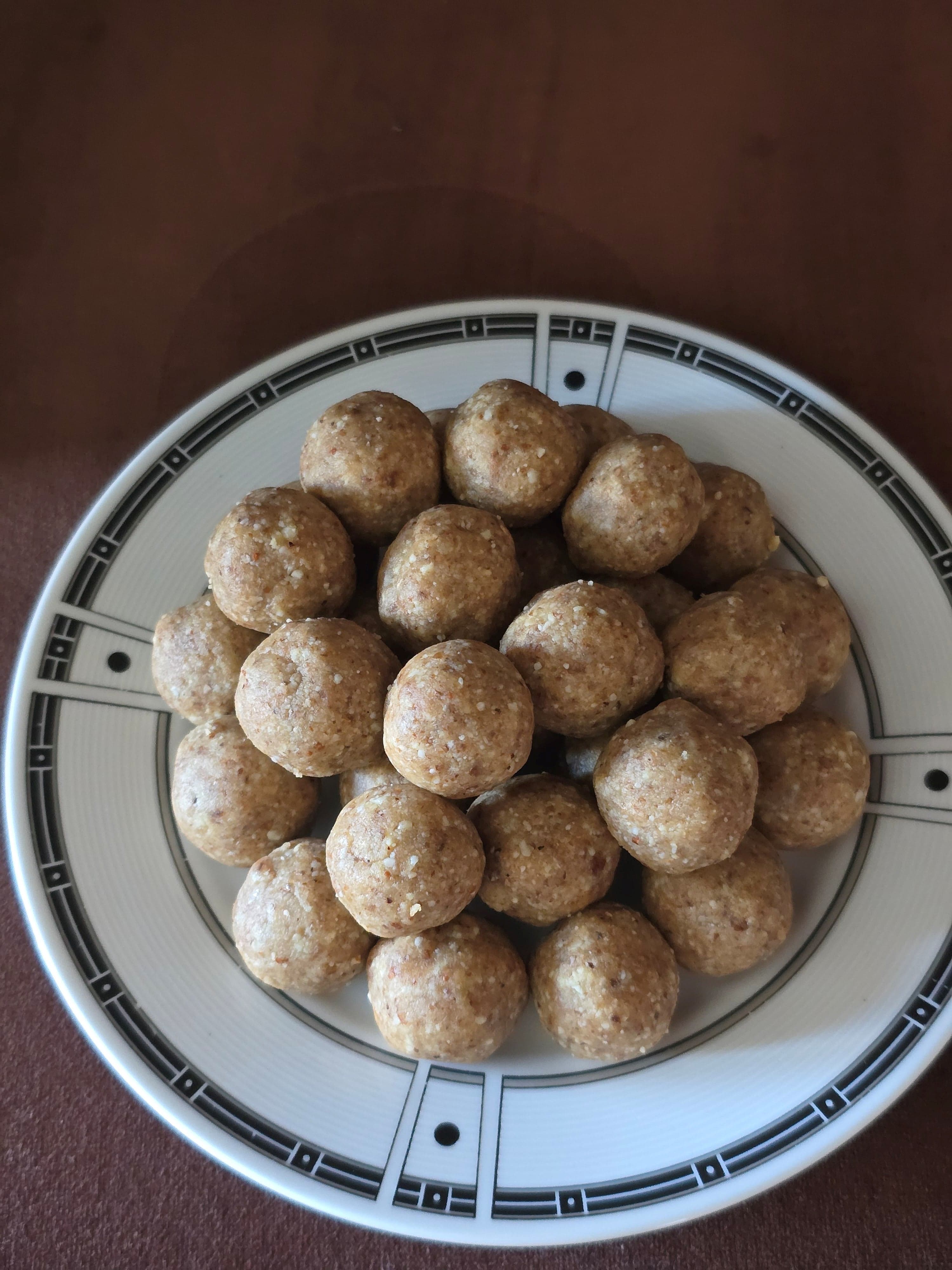 Aum Truffles — hand-rolled date and nut truffles in a gift box with assorted toppings